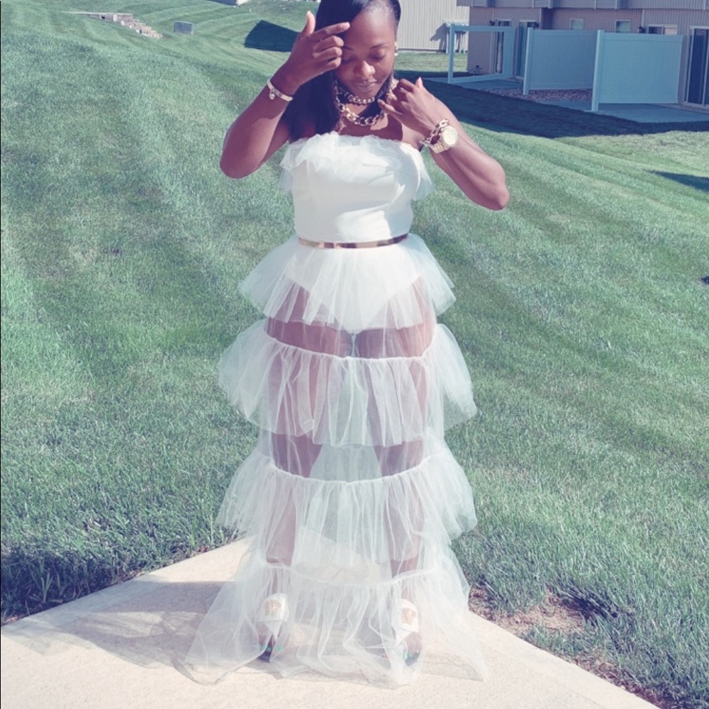 Beautiful long off the shoulder white dress.